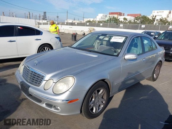 2005 Mercedes-Benz E-Class 3.2L with VIN WDBUF65JX5A718711, listed as a IAAI auction lot 41625603 with 145,024 mi miles. Bid and sale history available at carsss.com. Image 2.