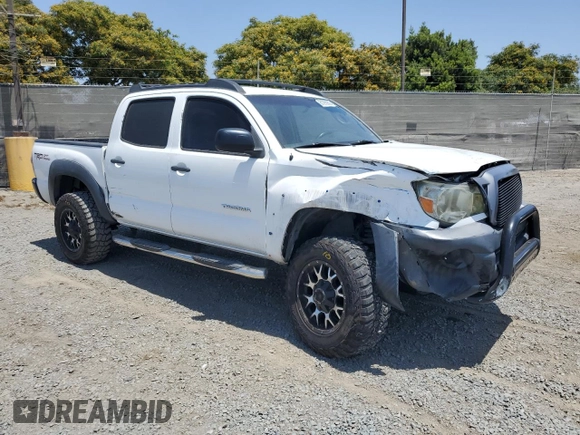 2010 Toyota Tacoma with VIN 3TMLU4EN6AM041048, listed as a Copart auction lot 61290985 with 199,384 mi miles and Salvage title. Bid and sale history available at DreamBid. Image 4.