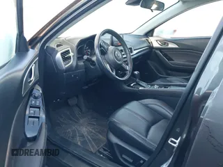 2018 Mazda 3 Touring with VIN 3MZBN1L32JM235162, listed as a IAAI auction lot 41596278 with 144,784 mi miles and . Bid and sale history available at DreamBid. Image 5.