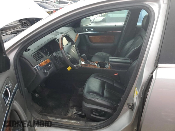 2014 Lincoln MKS with VIN 1LNHL9EK5EG606901, listed as a Copart auction lot 75300803 with 98,694 mi miles and Clean Title. Bid and sale history available at DreamBid. Image 7.
