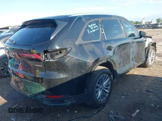 2024 Mazda CX-90 Select z VIN JM3KKAHD3R1165975, wystawiony jako IAAI lot #42086144 z przebiegiem 10 317 mil mil oraz . Historia ofert i sprzedaży dostępna na DreamBid. Obrazek 4.