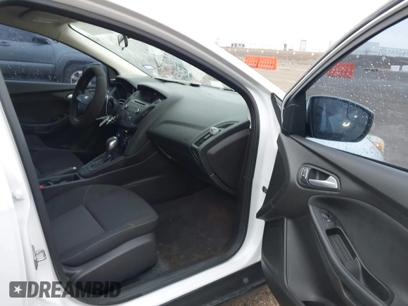 2016 Ford Focus SE with VIN 1FADP3F25GL312269, listed as a IAAI auction lot 41586489 with 76,216 mi miles. Bid and sale history available at carsss.com. Image 5.