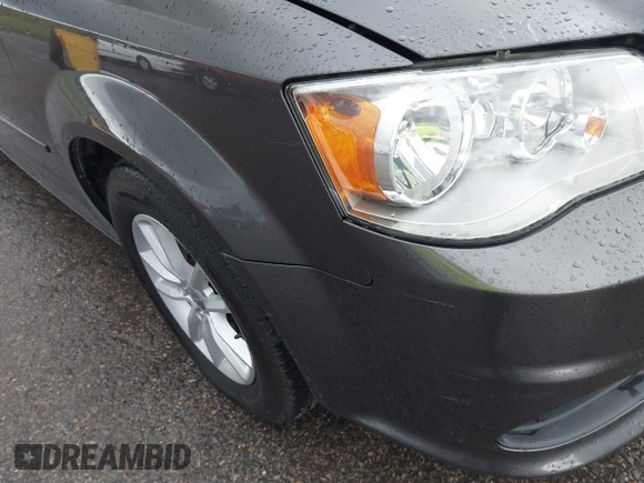 2016 Dodge Grand Caravan SXT with VIN 2C4RDGCG3GR242133, listed as a IAAI auction lot 40412052 with 95,091 mi miles and . Bid and sale history available at DreamBid. Image 17.