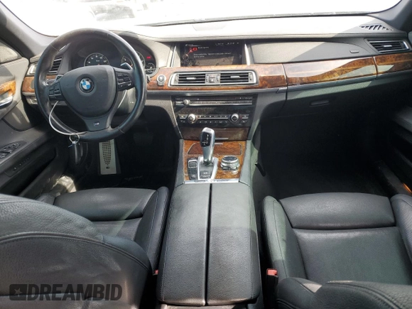 2014 BMW 7 Series 740Li with VIN WBAYE4C52ED138770, listed as a Copart auction lot 53647665 with 106,827 mi miles and Salvage title. Bid and sale history available at DreamBid. Image 8.