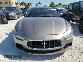 2014 Maserati Ghibli S Q4 z VIN ZAM57RTA6E1090293, wystawiony jako Copart lot #57298875 z przebiegiem 113 805 mil mil oraz Tytuł czysty. Historia ofert i sprzedaży dostępna na DreamBid. Obrazek 5.