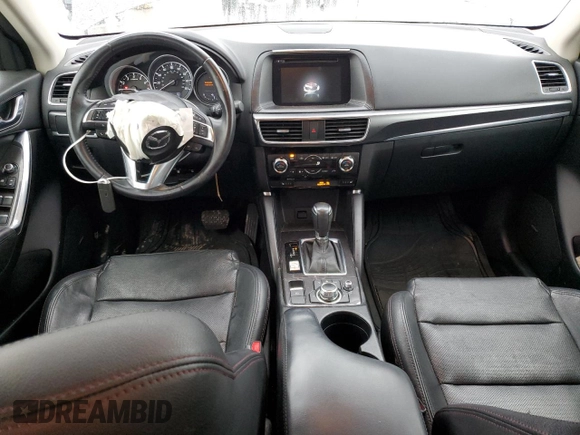 2016 Mazda CX-5 Grand Touring with VIN JM3KE2DY4G0811386, listed as a Copart auction lot 51961795 with 99,525 mi miles and Salvage Title. Bid and sale history available at carsss.com. Image 8.