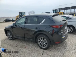 2021 Mazda CX-5 Grand Touring with VIN JM3KFBDM6M0401517, listed as a Copart auction lot 51019645 with 55,906 mi miles and Salvage Title. Bid and sale history available at DreamBid. Image 2.