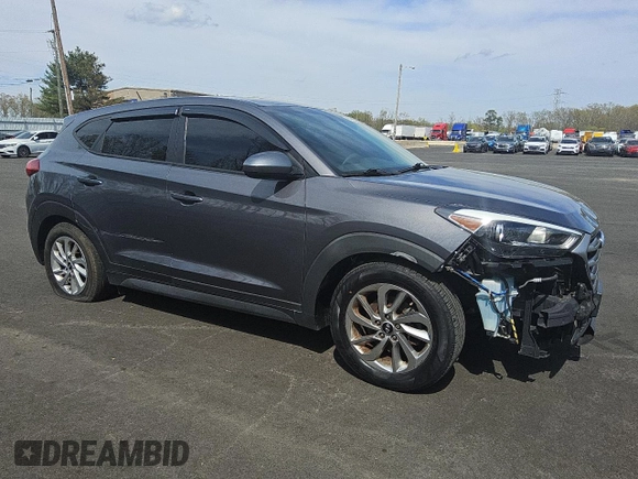 2018 Hyundai Tucson SE z VIN KM8J2CA49JU792947, wystawiony jako Copart lot #52633895 z przebiegiem 75 690 mil mil oraz Tytuł czysty. Historia ofert i sprzedaży dostępna na DreamBid. Obrazek 4.