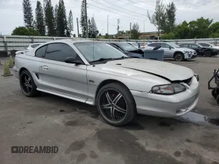 1998 Ford Mustang GT z VIN 1FAFP42XXWF229613, wystawiony jako Copart lot #63231905 z przebiegiem 65 669 mil mil oraz Szkoda całkowita • Salvage title. Historia ofert i sprzedaży dostępna na DreamBid. Obrazek 4.