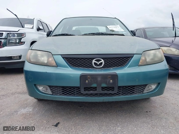 2002 Mazda Protege DX with VIN JM1BJ225420543719, listed as a IAAI auction lot 41778972 with NaN miles. Bid and sale history available at carsss.com. Image 16.