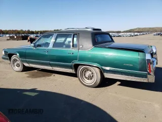 1992 Cadillac Brougham z VIN 1G6DW547XNR703499, wystawiony jako Copart lot #66709103 z przebiegiem Nie podano mil oraz Nie do naprawy. Historia ofert i sprzedaży dostępna na DreamBid. Obrazek 2.