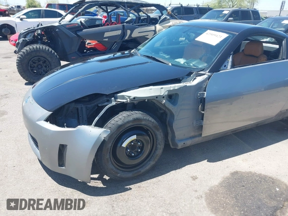 2004 Nissan 350Z Enthusiast z VIN JN1AZ34D74T164233, wystawiony jako IAAI lot #42509421 z przebiegiem 90 780 mil mil oraz . Historia ofert i sprzedaży dostępna na DreamBid. Obrazek 6.