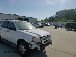 2009 Ford Escape XLS with VIN 1FMCU02719KB53740, listed as a Copart auction lot 55210035 with 144,672 mi miles and Salvage title. Bid and sale history available at DreamBid. Image 13.