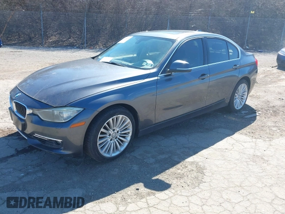 2012 BMW 3 Series 328i with VIN WBA3A5C53CF256338, listed as a IAAI auction lot 41758662 with 99,607 mi miles. Bid and sale history available at carsss.com. Image 2.