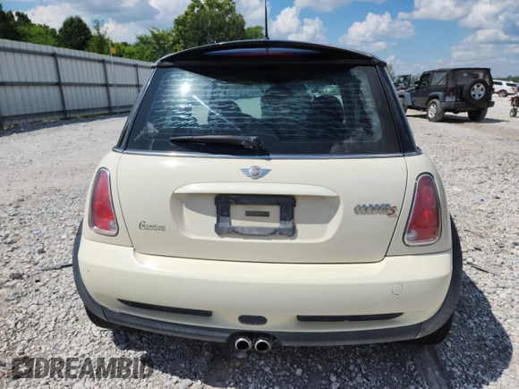2006 MINI Hardtop S with VIN WMWRE33556TJ38543, listed as a Copart auction lot 62420145 with 105,656 mi miles and Salvage title. Bid and sale history available at DreamBid. Image 6.