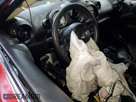 2014 MINI Countryman S with VIN WMWZC5C51EWP40354, listed as a Copart auction lot 57807125 with Not provided miles and Salvage title. Bid and sale history available at DreamBid. Image 8.