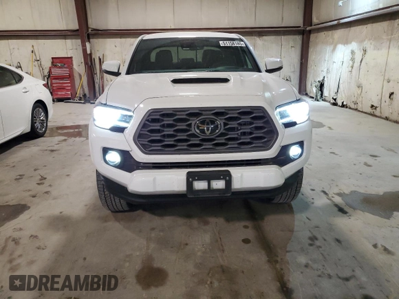 2023 Toyota Tacoma SR z VIN 3TMCZ5AN0PM651386, wystawiony jako Copart lot #51158185 z przebiegiem 23 642 mil mil oraz Szkoda całkowita • Salvage title. Historia ofert i sprzedaży dostępna na DreamBid. Obrazek 5.