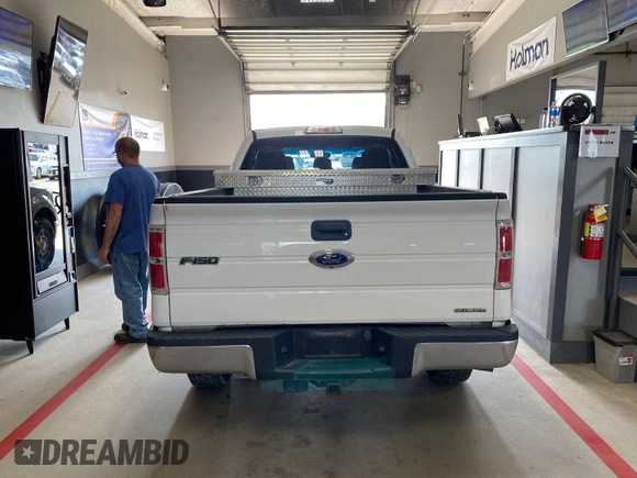 2014 Ford F-150 XL with VIN 1FTFX1EF5EFB70688, listed as a IAAI auction lot 42244439 with 182,779 mi miles and . Bid and sale history available at carsss.com. Image 1.