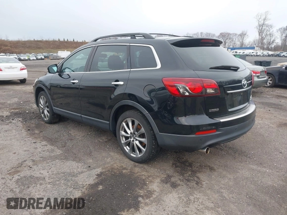 2015 Mazda CX-9 Grand Touring z VIN JM3TB3DV6F0464926, wystawiony jako IAAI lot #42035670 z przebiegiem 168 257 mil mil oraz . Historia ofert i sprzedaży dostępna na DreamBid. Obrazek 3.