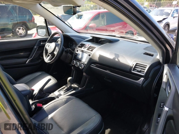 2018 Subaru Forester Touring with VIN JF2SJAWC6JH608722, listed as a IAAI auction lot 42309259 with 93,426 mi miles and . Bid and sale history available at DreamBid. Image 5.