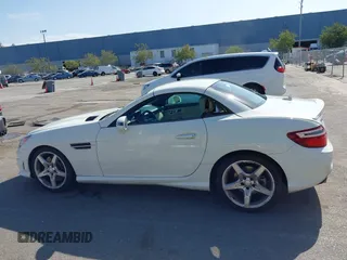 2013 Mercedes-Benz SLK-Class SLK 250 with VIN WDDPK4HA9DF057092, listed as a IAAI auction lot 42032120 with 142,991 mi miles. Bid and sale history available at carsss.com. Image 14.