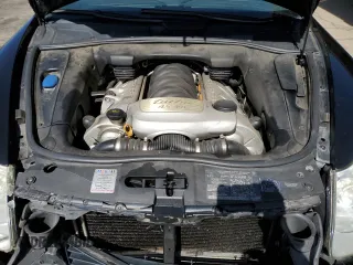 2004 Porsche Cayenne Turbo z VIN WP1AC29P94LA94194, wystawiony jako Copart lot #56866045 z przebiegiem 166 704 mil mil oraz Szkoda całkowita • Salvage title. Historia ofert i sprzedaży dostępna na DreamBid. Obrazek 12.