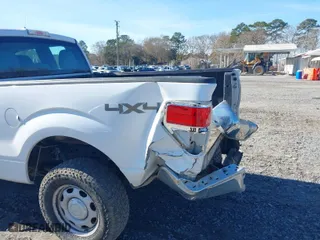 2014 Ford F-150 XL with VIN 1FTFX1EF0EKG09030, listed as a IAAI auction lot 41453528 with 209,664 mi miles. Bid and sale history available at carsss.com. Image 6.
