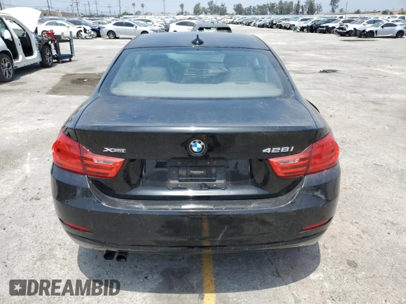 2014 BMW 4 Series 428i xDrive z VIN WBA3N9C56EF722472, wystawiony jako Copart lot #59873185 z przebiegiem 129 926 mil mil oraz Szkoda całkowita • Salvage title. Historia ofert i sprzedaży dostępna na DreamBid. Obrazek 6.