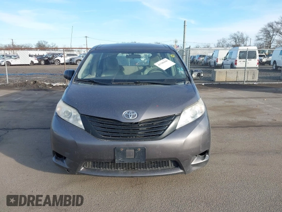 2012 Toyota Sienna with VIN 5TDZK3DCXCS258843, listed as a IAAI auction lot 41700446 with 207,384 mi miles. Bid and sale history available at carsss.com. Image 12.