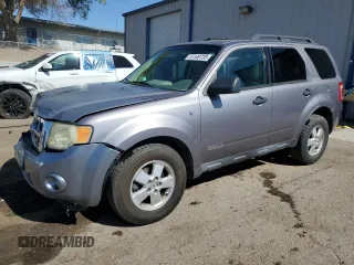 2008 Ford Escape XLT with VIN 1FMCU03158KA50345, listed as a Copart auction lot 57349735 with 195,316 mi miles and Salvage title. Bid and sale history available at DreamBid. Image 1.