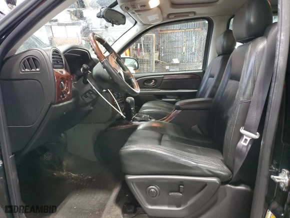 2005 GMC Envoy Denali with VIN 1GKET63M152386829, listed as a Copart auction lot 41901885 with 51,088 mi miles and Salvage Title. Bid and sale history available at carsss.com. Image 7.