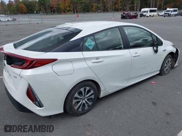 2021 Toyota Prius LE with VIN JTDKAMFP4M3183182, listed as a IAAI auction lot 41247715 with 46,673 mi miles and . Bid and sale history available at DreamBid. Image 4.