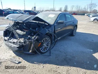 2024 Cadillac CT5 Premium Luxury z VIN 1G6DT5RW6R0108393, wystawiony jako IAAI lot #41404644 z przebiegiem 10 370 mil mil oraz . Historia ofert i sprzedaży dostępna na DreamBid. Obrazek 17.