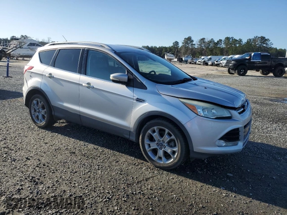 2015 Ford Escape Titanium with VIN 1FMCU0J91FUA94899, listed as a Copart auction lot 47746295 with 138,532 mi miles and Salvage Title. Bid and sale history available at DreamBid. Image 4.