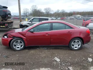 2009 Pontiac G6 1SA with VIN 1G2ZG57BX94120938, listed as a IAAI auction lot 42080712 with 83,343 mi miles and . Bid and sale history available at DreamBid. Image 14.