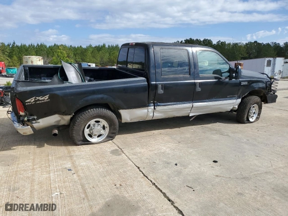 2002 Ford Super Duty F-250 XL with VIN 1FTNW21F92EA03004, listed as a Copart auction lot 49316115 with 209,520 mi miles and Salvage Title. Bid and sale history available at carsss.com. Image 3.