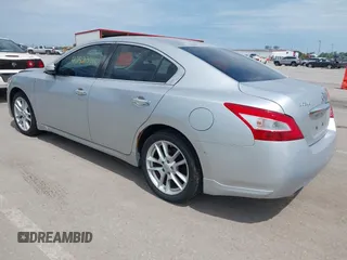 2009 Nissan Maxima S with VIN 1N4AA51E29C853185, listed as a IAAI auction lot 42523716 with 146,957 mi miles and . Bid and sale history available at DreamBid. Image 3.