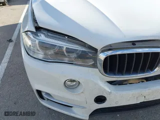 2016 BMW X5 xDrive35i with VIN 5UXKR0C52G0P29633, listed as a IAAI auction lot 41057391 with 176,697 mi miles. Bid and sale history available at carsss.com. Image 6.