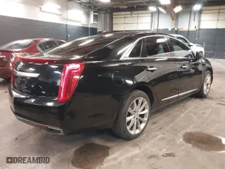 2013 Cadillac XTS Luxury with VIN 2G61R5S34D9102625, listed as a IAAI auction lot 41668752 with 112,065 mi miles. Bid and sale history available at carsss.com. Image 4.