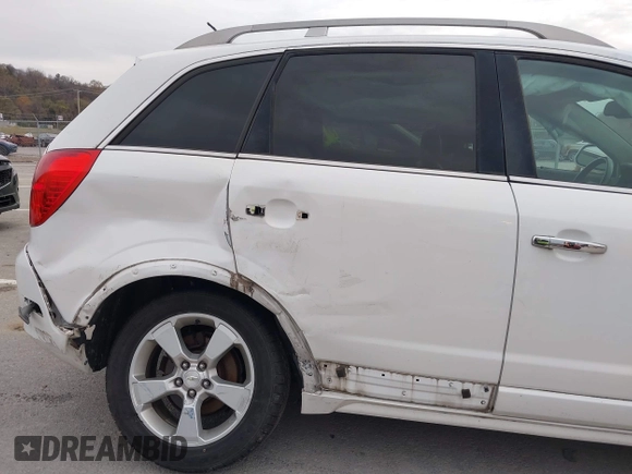 2014 Chevrolet Captiva Sport LTZ z VIN 3GNAL4EK6ES631467, wystawiony jako IAAI lot #40948171 z przebiegiem 146 395 mil mil oraz . Historia ofert i sprzedaży dostępna na DreamBid. Obrazek 6.