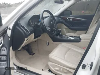 2015 Infiniti Q50 Premium z VIN JN1BV7AP9FM331131, wystawiony jako IAAI lot #41786108 z przebiegiem 176 874 mil mil oraz . Historia ofert i sprzedaży dostępna na DreamBid. Obrazek 5.