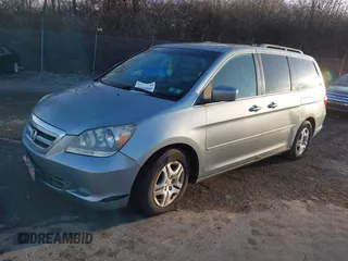 2007 Honda Odyssey EX-L z VIN 5FNRL387X7B081408, wystawiony jako IAAI lot #41143045 z przebiegiem 201 248 mil mil oraz . Historia ofert i sprzedaży dostępna na DreamBid. Obrazek 2.
