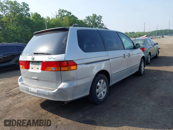 2002 Honda Odyssey EX-L z VIN 2HKRL18062H533064, wystawiony jako IAAI lot #42273694 z przebiegiem Nie podano mil oraz . Historia ofert i sprzedaży dostępna na DreamBid. Obrazek 4.