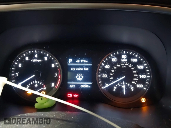 2020 Hyundai Tucson Value z VIN KM8J3CA40LU163884, wystawiony jako IAAI lot #41780266 z przebiegiem 60 687 mil mil oraz . Historia ofert i sprzedaży dostępna na DreamBid. Obrazek 7.