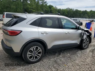 2020 Ford Escape SEL z VIN 1FMCU9H66LUB44403, wystawiony jako Copart lot #57934925 z przebiegiem Nie podano mil oraz Szkoda całkowita • Salvage title. Historia ofert i sprzedaży dostępna na DreamBid. Obrazek 3.