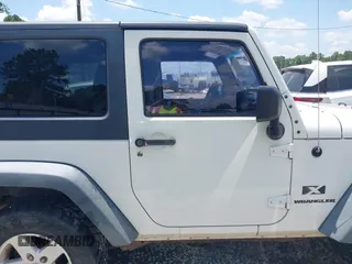 2009 Jeep Wrangler X with VIN 1J4FA24149L781794, listed as a IAAI auction lot 42352426 with 99,128 mi miles and . Bid and sale history available at DreamBid. Image 13.