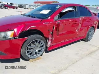 2015 Mitsubishi Lancer GT with VIN JA32U8FW9FU014308, listed as a IAAI auction lot 41982416 with 227,574 mi miles. Bid and sale history available at carsss.com. Image 6.