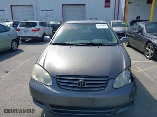 2004 Toyota Corolla CE with VIN 1NXBR38E84Z331547, listed as a IAAI auction lot 41963632 with 202,984 mi miles. Bid and sale history available at carsss.com. Image 12.