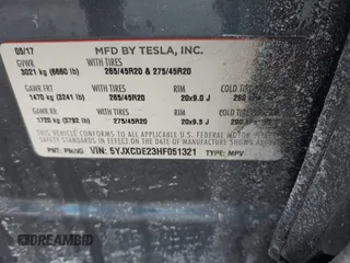 2017 Tesla Model X 90D with VIN 5YJXCDE23HF051321, listed as a IAAI auction lot 41415384 with 127,476 mi miles and . Bid and sale history available at carsss.com. Image 9.