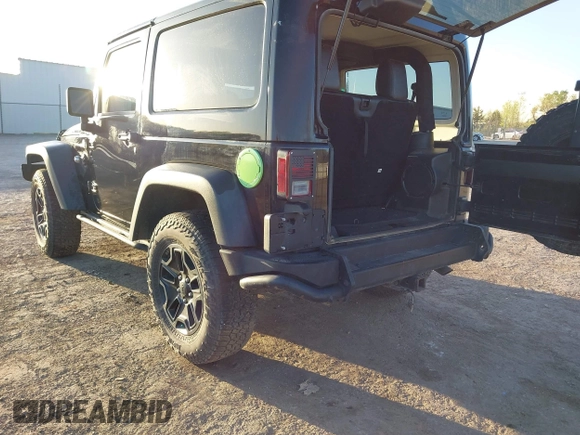 2013 Jeep Wrangler Sahara with VIN 1C4AJWBG8DL565227, listed as a IAAI auction lot 41987087 with 90,644 mi miles and . Bid and sale history available at DreamBid. Image 3.